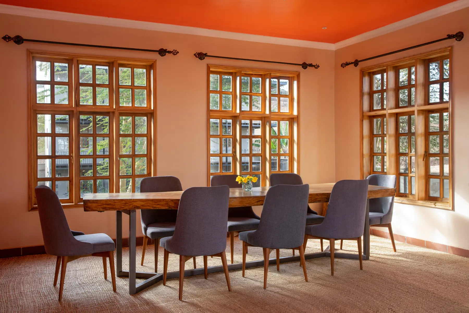 Dining room with tall timber windows