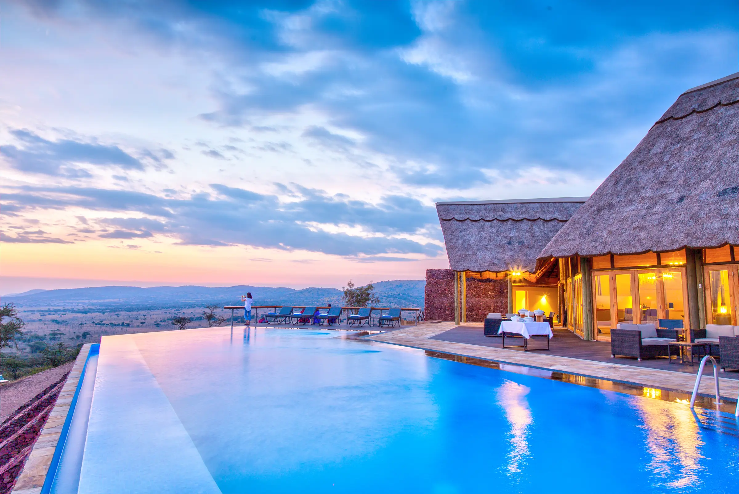 Lahia main house and infinity pool at dusk