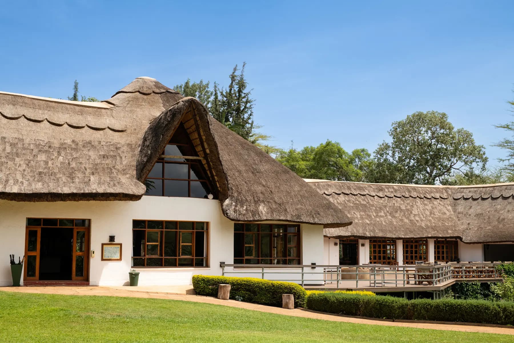 Main house with lawns and flower beds